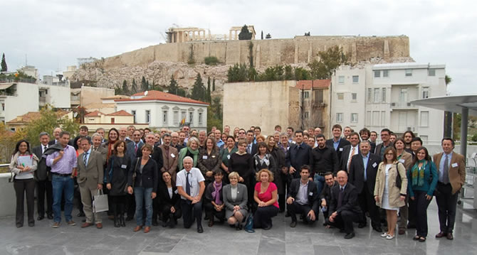 The delegates outside the Acropolis Museum Conference Centre, the Parthenon in the background